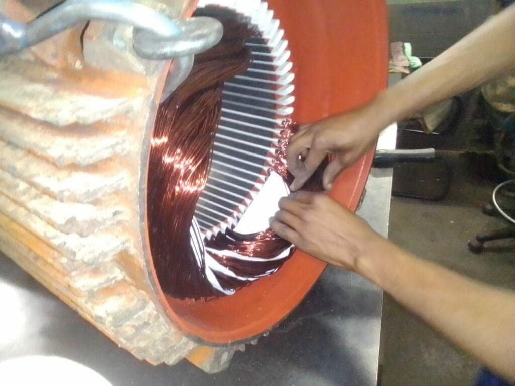 Electric motor stator rewinding
