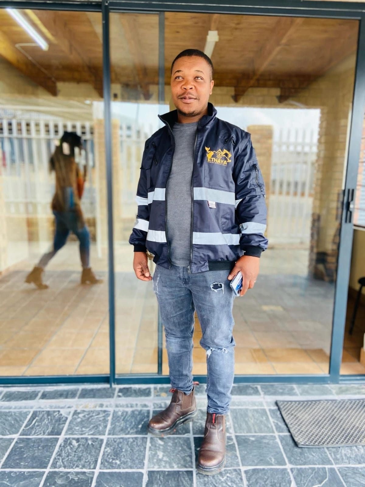 Ethaya team member in branded workwear
